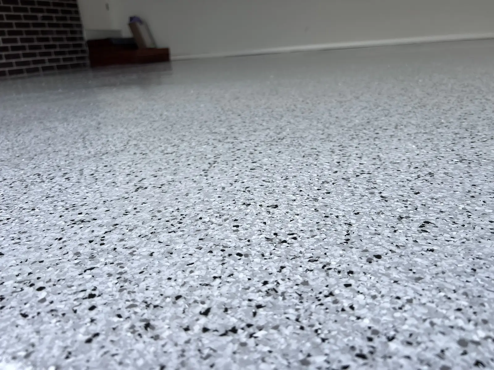 White and grey decorative flake residential garage floor